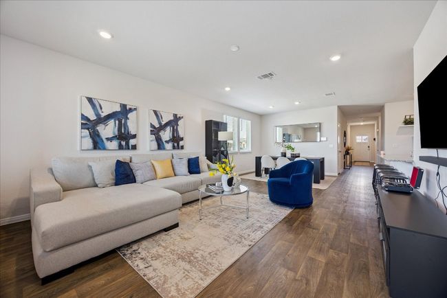 Living room featuring dark wood-style flooring and recessed lighting | Image 14