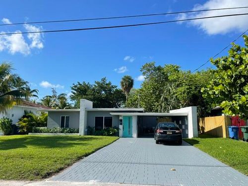 1560 Ne 32nd St, Oakland Park, FL, 33334-5318 | Card Image