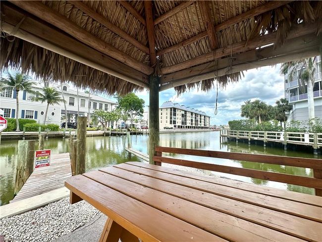 Tiki Hut View. Boat docks and Seawalls provide gulf access by boat or kayak | Image 8