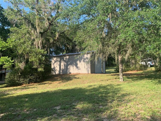 24605 Ne 177 Th Ter, House other with 3 bedrooms, 2 bathrooms and null parking in Fort Mc Coy FL | Image 18