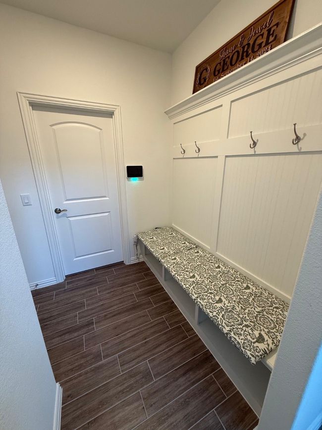 Mudroom with wood finish floors and baseboards | Image 20