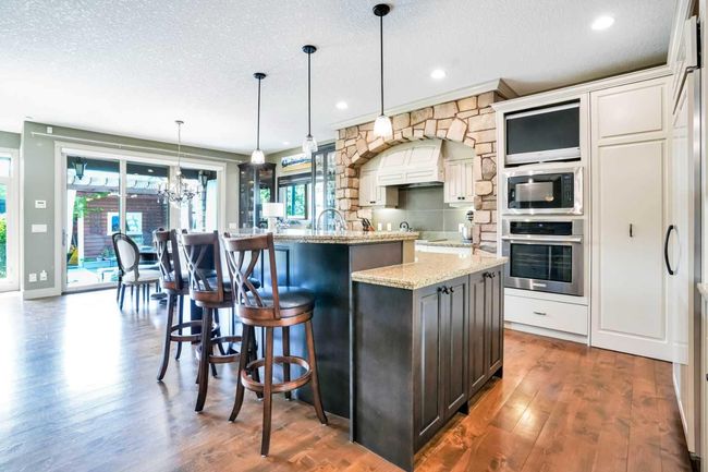 511 Evergreen Circle Sw, House other with 3 bedrooms, 3 bathrooms and 4 parking in Calgary AB | Image 8
