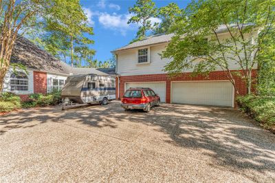 122 E Park Drive, House other with 4 bedrooms, 3 bathrooms and null parking in Conroe TX | Image 2