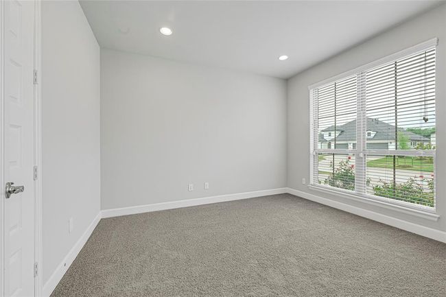 Study/home office with plenty of natural lighting. Classy, glass French doors. There is a small closet too. | Image 6