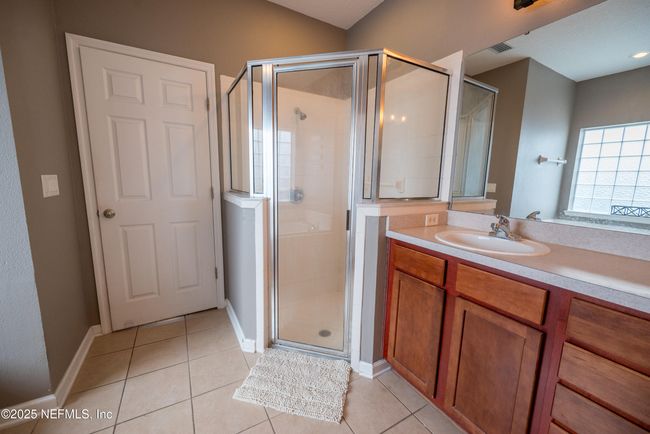 11760 Huckleberry Trl E, House other with 4 bedrooms, 2 bathrooms and null parking in MACCLENNY FL | Image 20