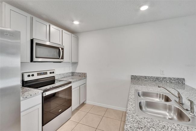 10392 Sheffield Rd, House other with 4 bedrooms, 2 bathrooms and null parking in Spring Hill FL | Image 35