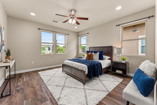 Bedroom with recessed lighting, dark wood finished floors, and a ceiling fan | Image 13
