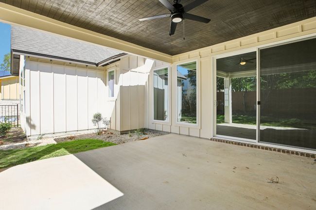 View of patio with ceiling fan | Image 35