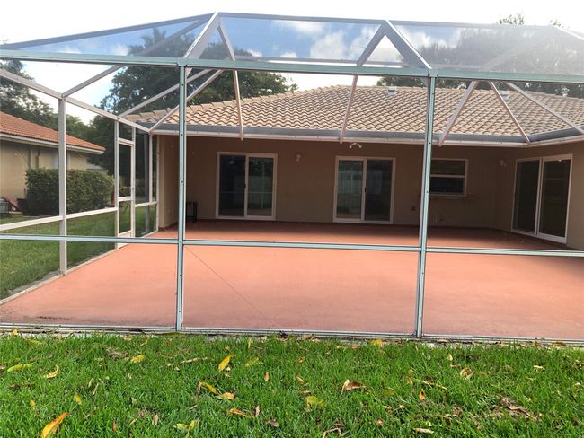 9840 Nw 28 Th Ct, House other with 4 bedrooms, 2 bathrooms and null parking in Coral Springs FL | Image 6