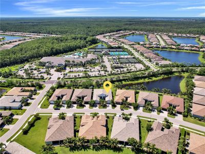 Bird's eye view with a water view | Image 1