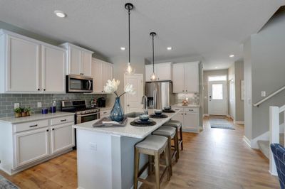 Stunning AND functional, as the family chef has plenty of room to maneuver as that next masterpiece is prepared!! *photo of model with same floor plan. Selections will differ. | Image 3