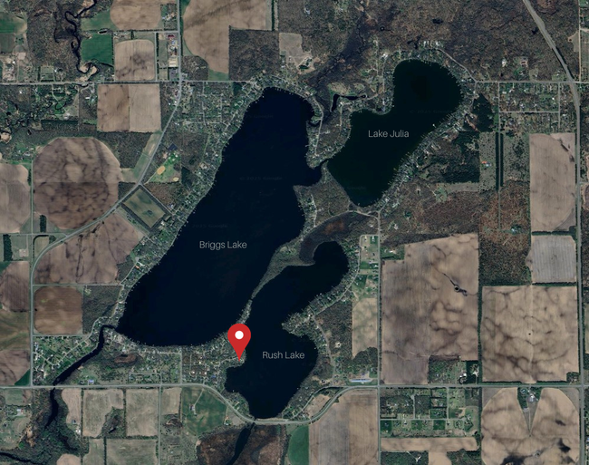 Pictured is the Briggs Chain of Lakes with the property location marked. | Image 27