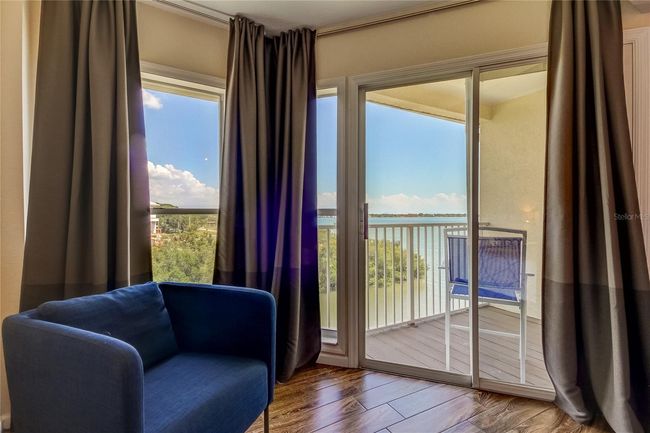 Primary Bedroom with Balcony Views | Image 25