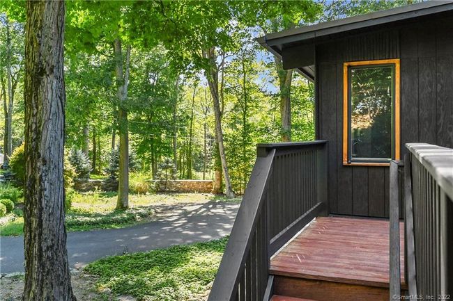 Looking towards stone fence in front yard | Image 35