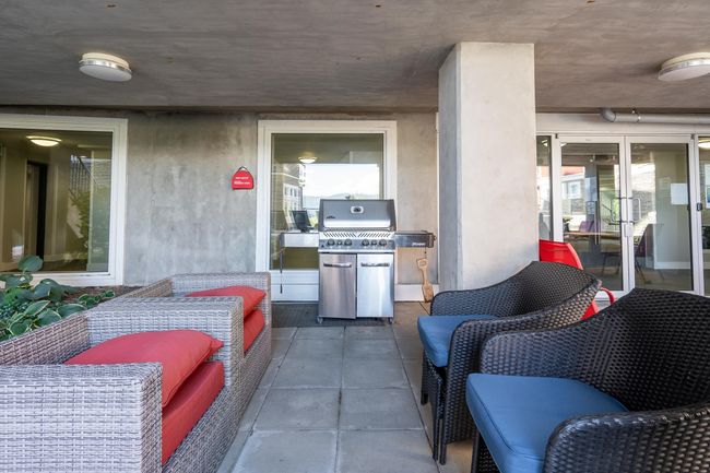 View of patio / terrace featuring a grill | Image 18