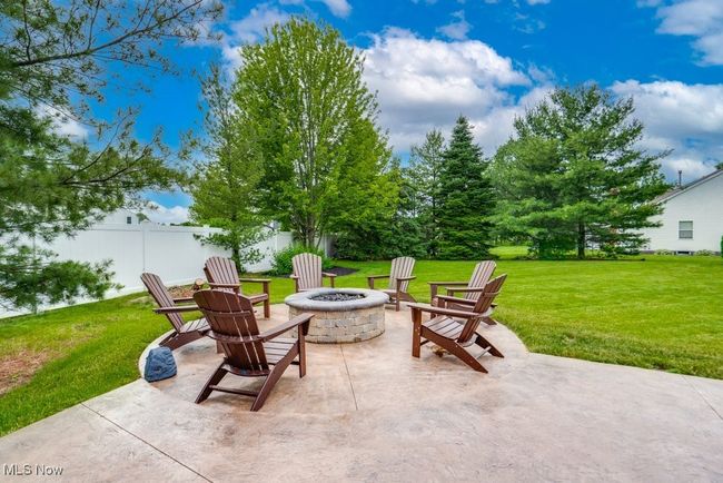 View of patio / terrace with a fire pit | Image 41