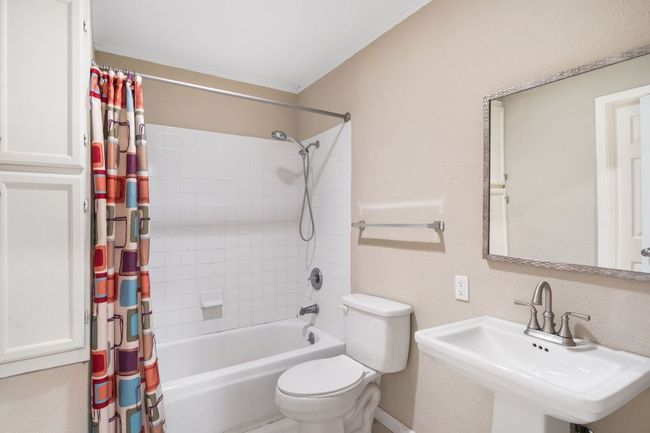 Secondary full bathroom on main level | Image 17