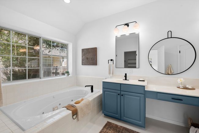 Primary bathroom with soaking tub, dual vanity and walk-in shower | Image 14