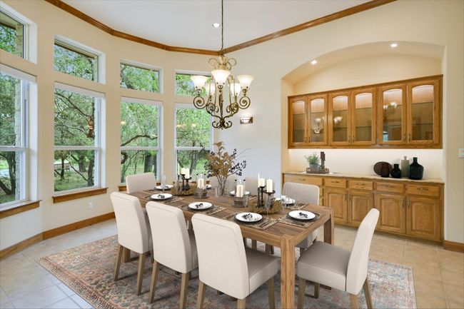 Wouldn't you like your gatherings to be enjoyed here? The forest provides privacy, so, no need for shades, but there is an electric shade for the lower windows. | Image 5
