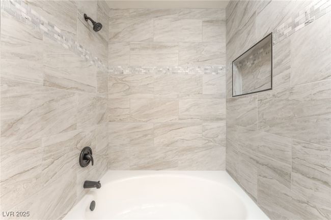Full bathroom featuring shower / washtub combination | Image 20