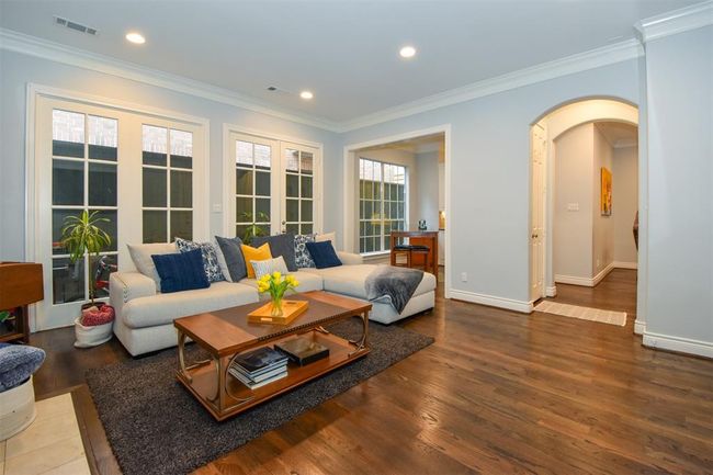 Alternate view of the family room which opens to a hallway, well thought of floor plan | Image 10