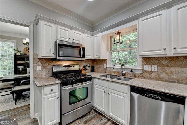 5574 Wynhall Dr, House other with 4 bedrooms, 3 bathrooms and null parking in Peachtree Corners GA | Image 18