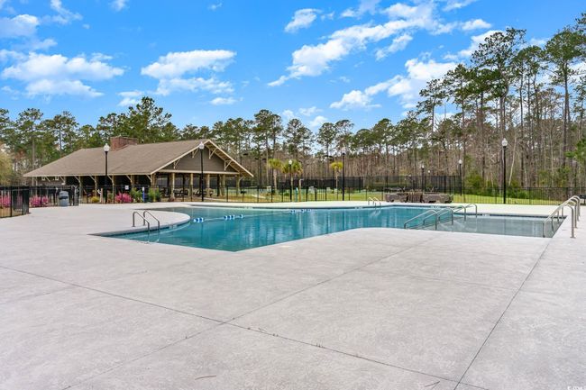 Community pool featuring a patio | Image 34