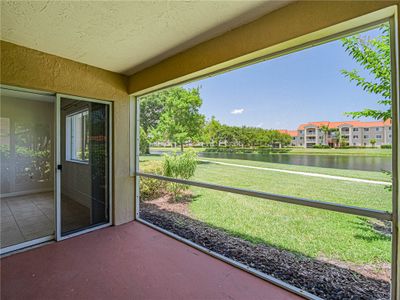 Primary bedroom Sliding glass doors to screened porch. | Image 2