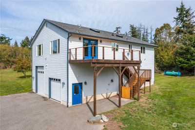 1632 square foot one bedroom home sits above an oversized garage. | Image 1