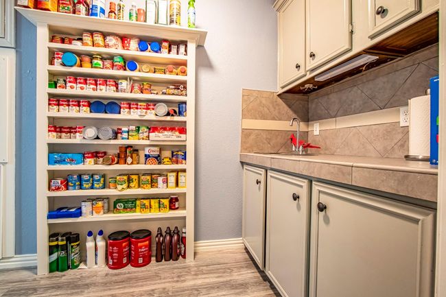 The pantry build in plus the cabinets on the right will give you even more storage space. | Image 12
