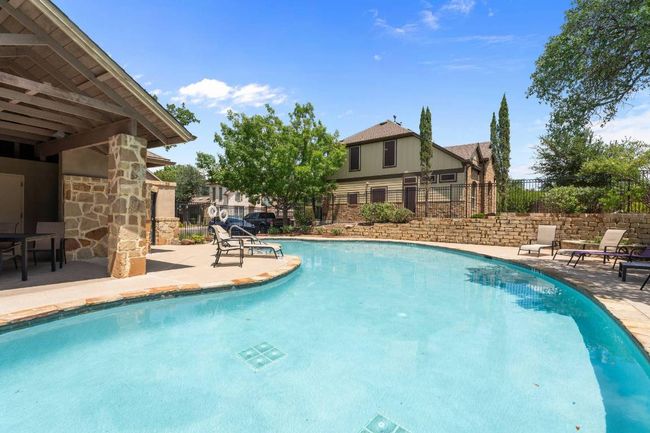Community pool features bathrooms and a shower for your convenience. | Image 35