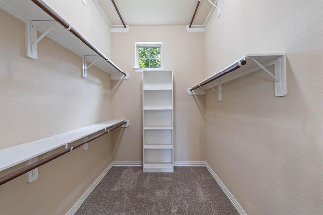 One of the two primary bedroom closets. | Image 25