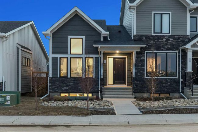 25 Larkspur Bend, Home with 3 bedrooms, 2 bathrooms and 2 parking in Okotoks AB | Image 1