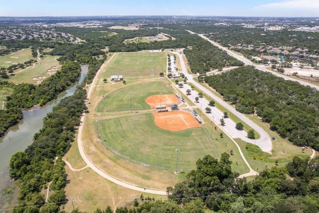 Imagine enjoying morning jogs or mountain biking along wooded creekside paths, paddleboarding at sunset, or having weekend picnics by the water—all without straying far from home. | Image 39
