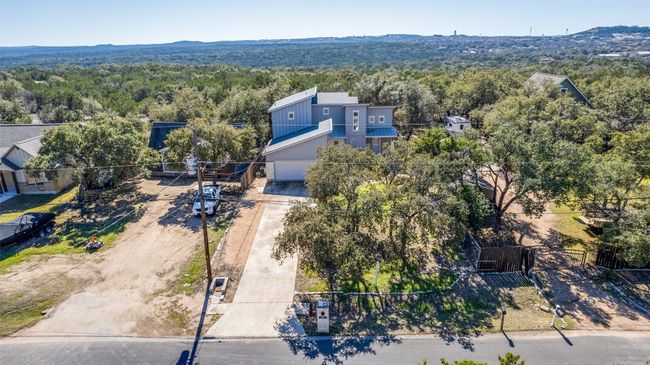 Birds eye view of property featuring a forest view | Image 30