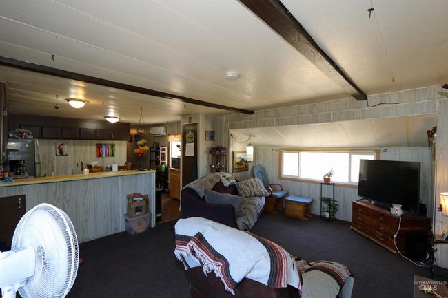 View of carpeted living area | Image 13