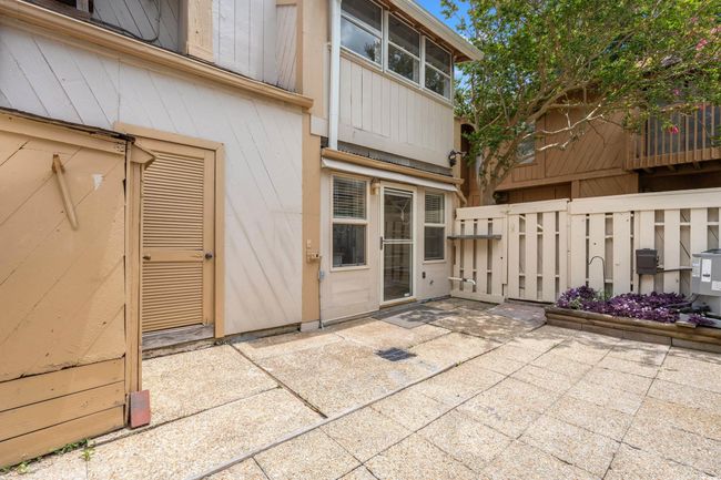 Entrance to property with a patio area | Image 30