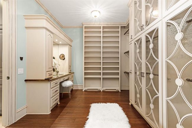 (There are two closets for primary bedroom, this one was designed for the Mrs. of the home) The other one is more masculine and also has plenty of space | Image 30