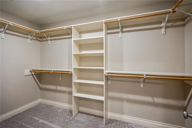 Spacious closet with carpet | Image 40
