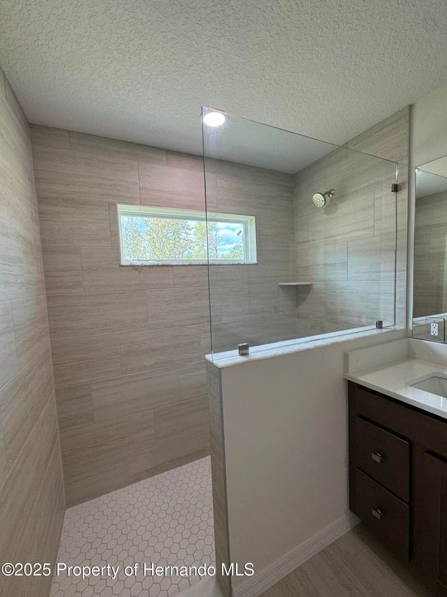 13050 Tinamou Ave, House other with 4 bedrooms, 2 bathrooms and null parking in WEEKI WACHEE FL | Image 10