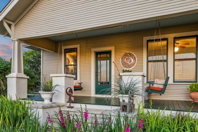 The relaxing front porch of the main house. | Image 19