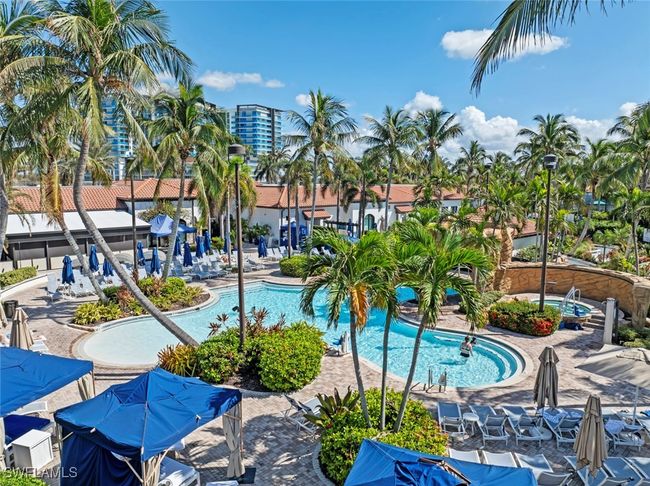 View of swimming pool featuring a patio area | Image 14