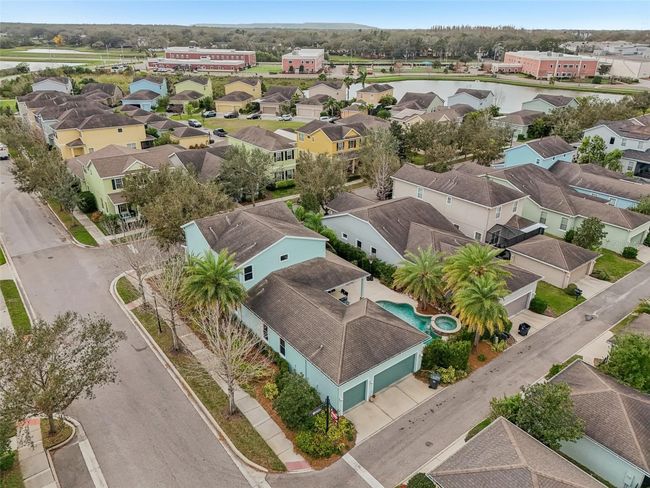 LARGE CORNER LOT ADDS EASY PARKING AND ACCESS! | Image 61
