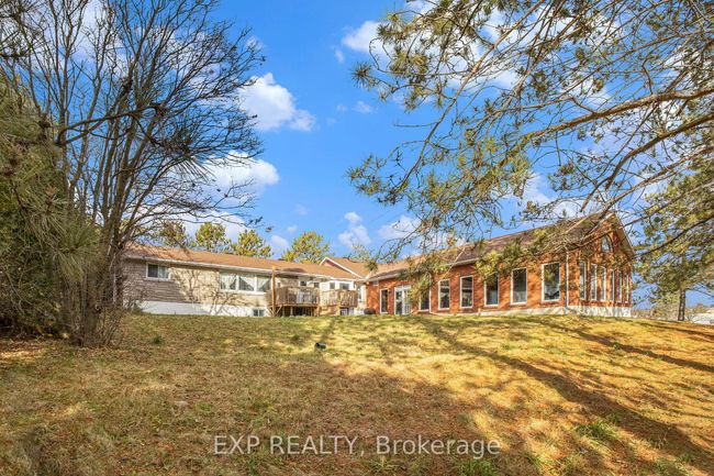 8411 Russell Rd, House other with 7 bedrooms, 5 bathrooms and 30 parking in Navan ON | Image 31