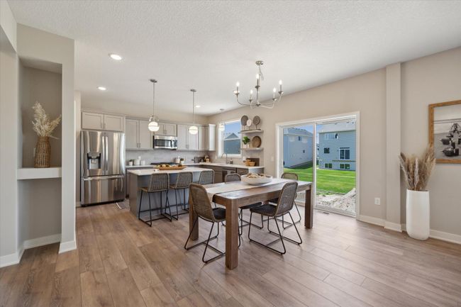 Kitchen cabinets are available in several paints and/or stains. SS appliances included. This is not the actual home for sale, but photos of the same floorplan. Additional options may be shown. | Image 6