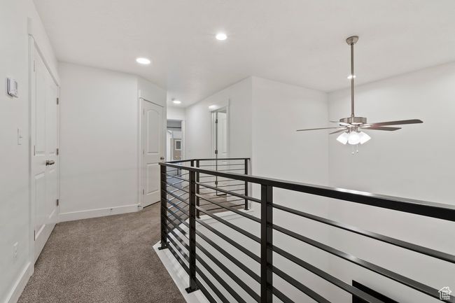 Dramatic upper hallway with beautiful railing | Image 12
