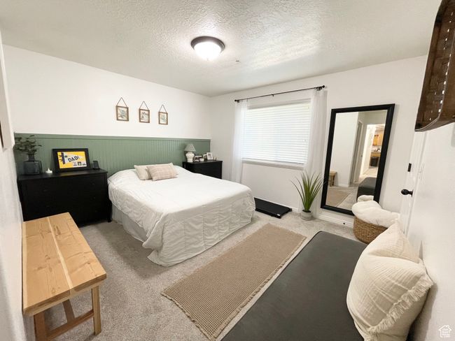 Primary bedroom featuring a ensuite bathroom | Image 11