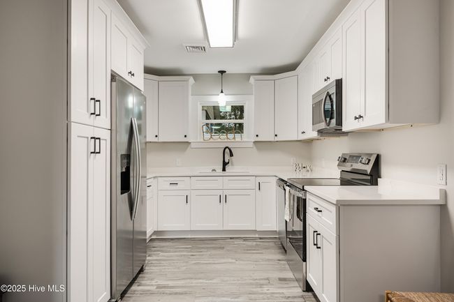 114 Nw 14 Th St, House other with 3 bedrooms, 2 bathrooms and null parking in Oak Island NC | Image 14