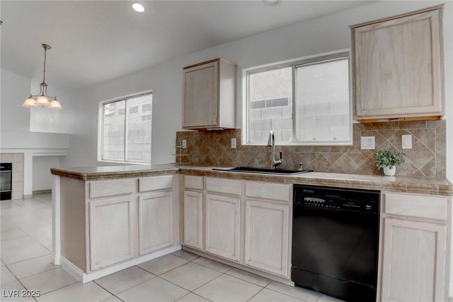 Kitchen featuring decorative backsplash | Image 12