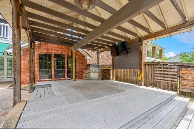 Gather your friends and family for an outdoor barbeque or a chance to watch football! Very inviting! | Image 6